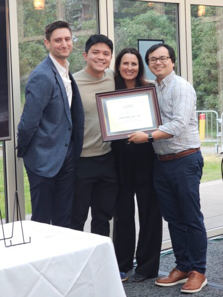 Julian Hong, MD, (right) receives 2026 ARRO Teacher of the Year Award